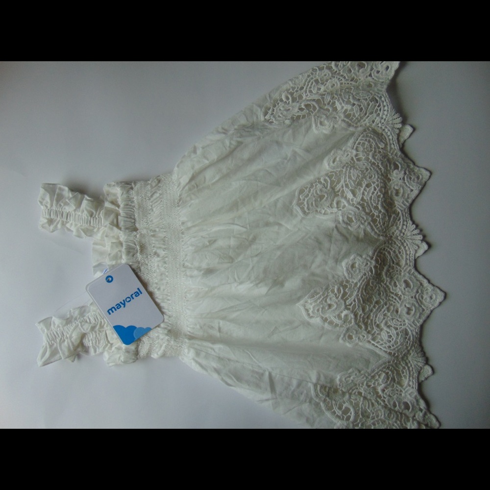 White very detailed sleeveless dress
